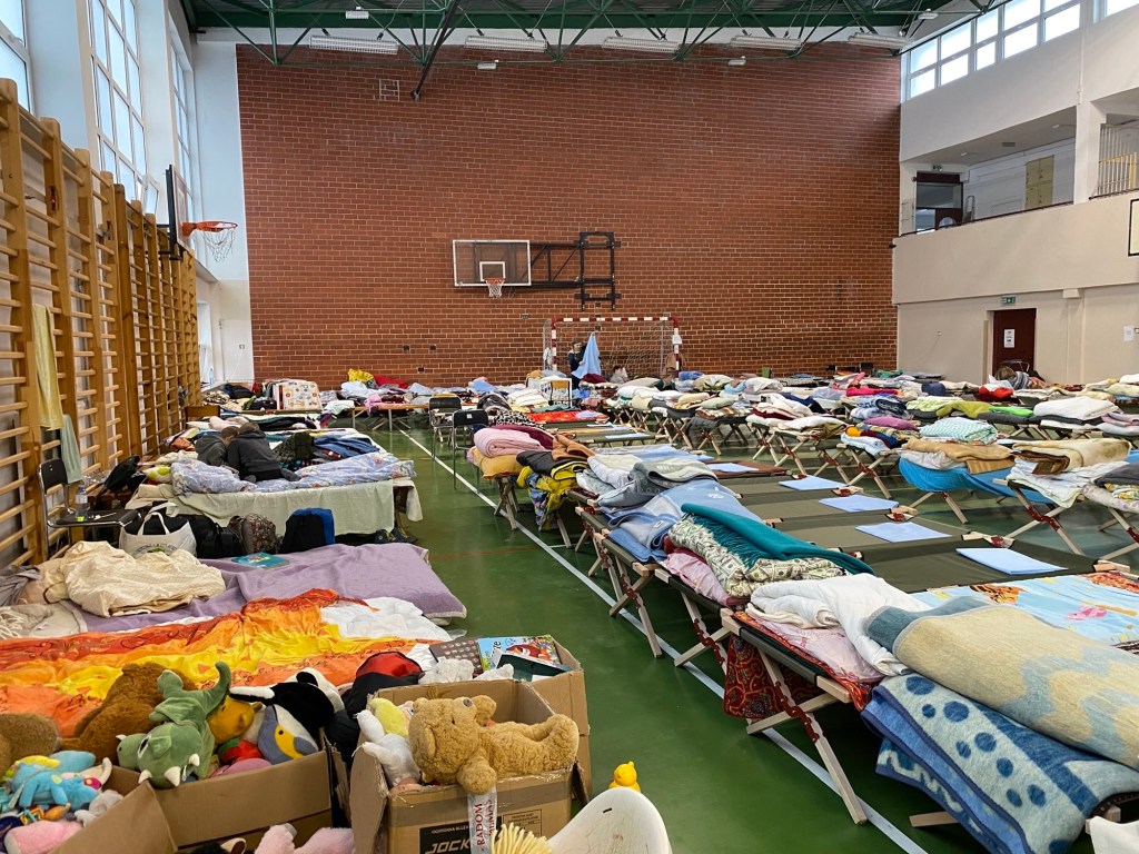 A Polish high school in Zamosc has been transformed into a temporary safe haven for up to 2,000 Ukrainian refugees each day.