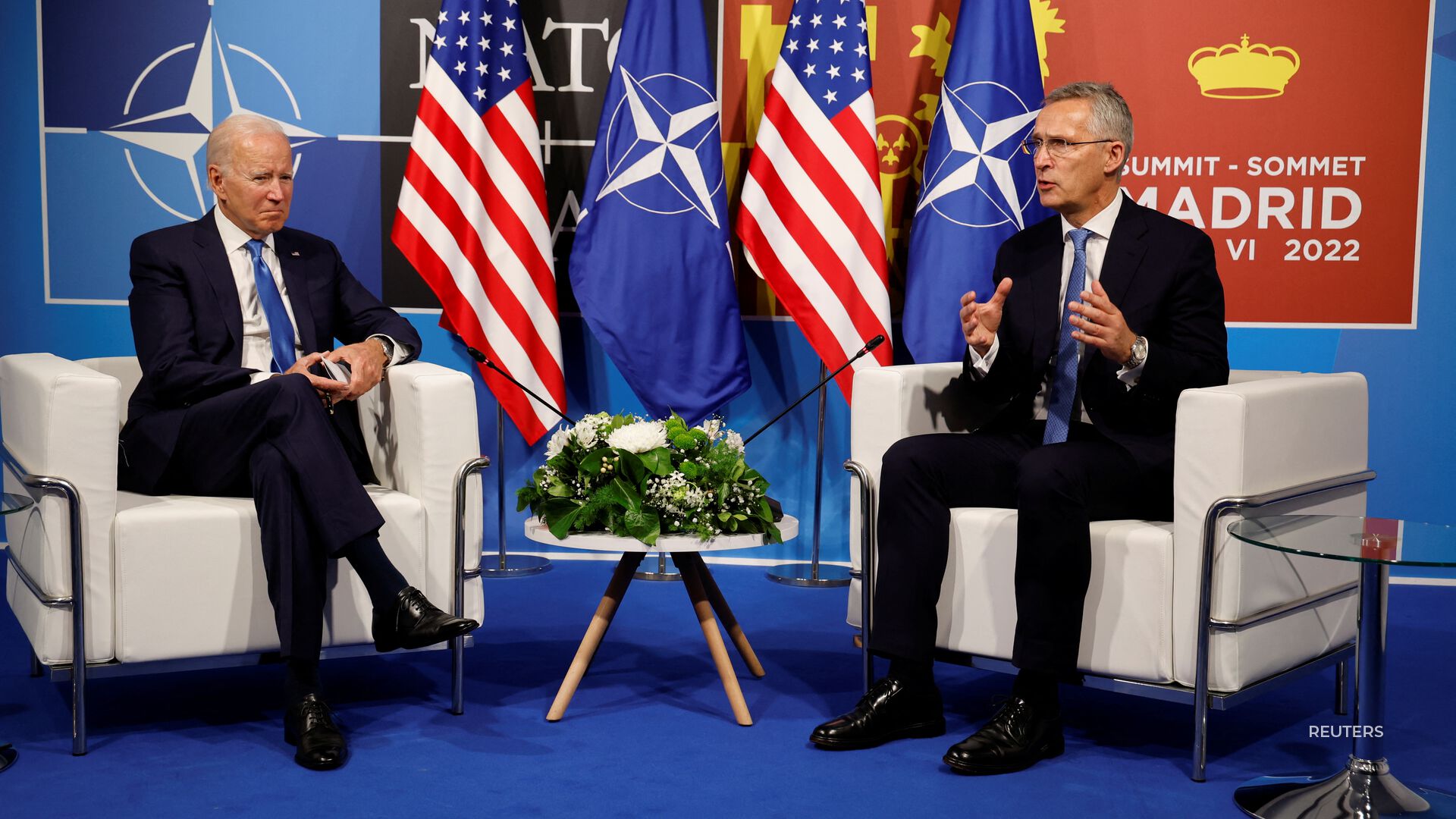 NATO invited Finland and Sweden as Biden pledged to step up the military presence in Europe.
