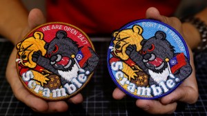 As China concluded simulated attacks around Taiwan, an unofficial badge featuring a black bear sucker-punching Winnie the Pooh went viral.