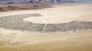 Tribal rangers in Nevada drove through environmental activists' road blockade which was causing a traffic jam for Burning Man attendees.