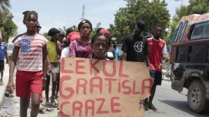 About 200 Haitians marched in the capital city of Port-Au-Prince just days after an American nurse and her daughter were kidnapped in Haiti.