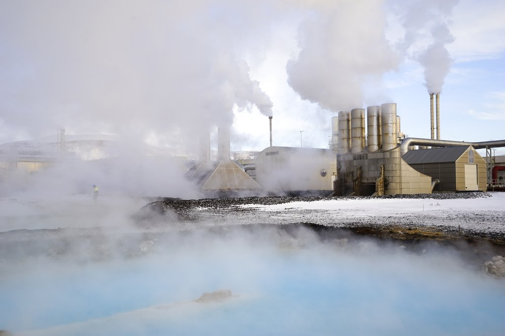 In this photo taken on Jan. 18, 2018, large clouds of steam rise into the sky from the Svartsengi geothermal power station in Grindavík, Iceland. With massive amounts of energy needed to obtain bitcoins, large cryptocurrency mining companies have established a base in Iceland, a cold North Atlantic island with an abundance of renewable energy from geothermal and hydroelectric power plants. (AP Photos/Egill Bjarnason)