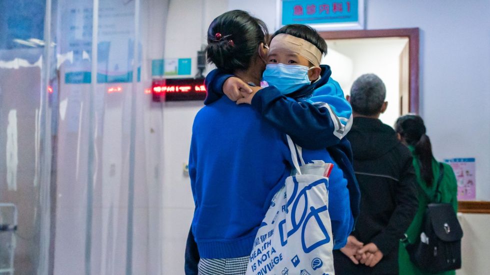 China's hospitals are seeing a surge in respiratory illnesses and pneumonia in children. Officials claim it's due to the recent lifting of lockdowns.