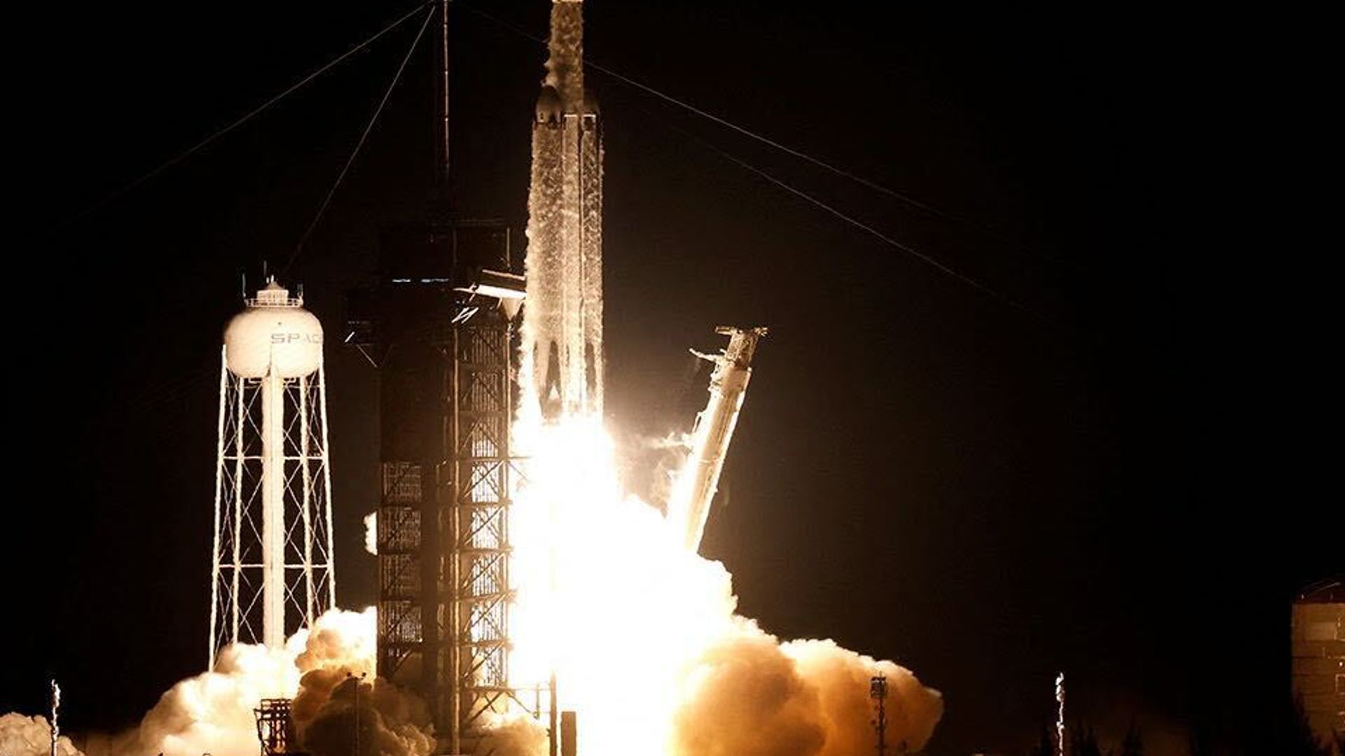 The U.S. military's X-37B robot space plane blasted off on another secretive mission Thursday night with the help of SpaceX.