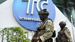 A group of masked gunmen stormed the set of a live TV news broadcast in Ecuador waving guns and explosives.