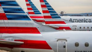 American Airlines has announced it is raising checked bag fees for the first time since 2018 and restructuring its customer rewards.