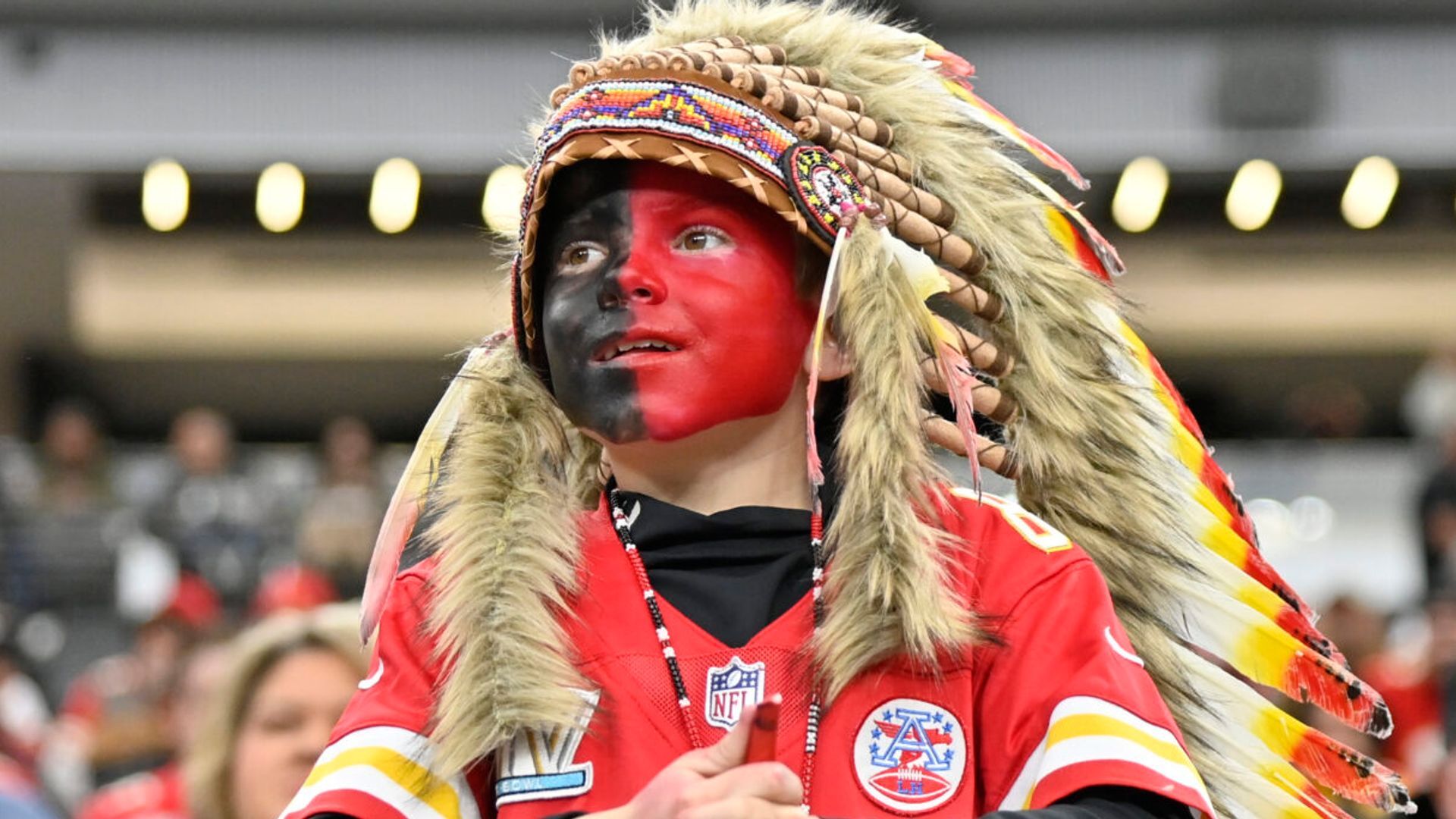 The boy's family is suing Deadspin for defamation following an article accusing him of wearing blackface at a Chiefs game.