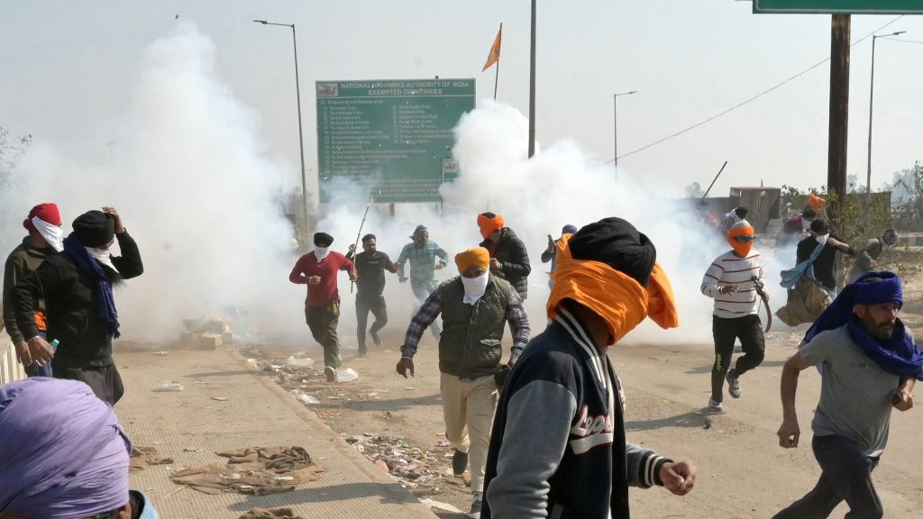 Farmers in India clash with authorities during protest.