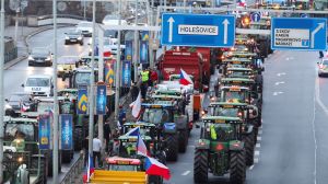 Farmers blocked some lanes of traffic in downtown Prague as they protested rising prices and government regulations on Monday, Feb. 19.