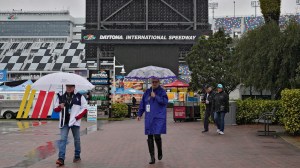 Fans leave the track after the NASCAR Daytona 500 auto race was rained out Sunday, Feb. 18, 2024, at Daytona International Speedway in Daytona Beach, Fla. The race is rescheduled for Monday afternoon. (AP Photo/Chris O'Meara)