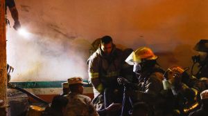Staff members are accused of keeping migrants locked inside a cell during a deadly fire at a detention center in Juarez, Mexico.