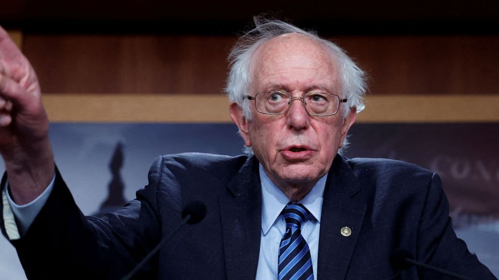 Sen. Bernie Sanders clashed with a reporter over a proposed 32-hour workweek, emphasizing concerns about income inequality in the tax system.