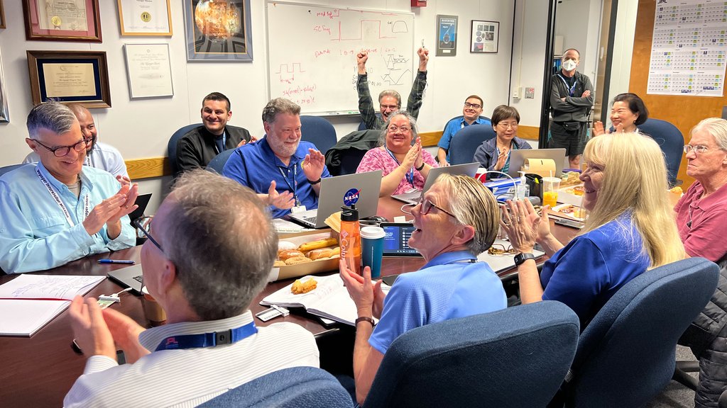 After receiving data about the health and status of Voyager 1 for the first time in five months, members of the Voyager flight team celebrate in a conference room at NASA’s Jet Propulsion Laboratory on April 20. Credit: NASA/JPL-Caltech