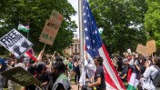 A group of fraternity brothers prevented protesters from removing an American flag and replacing it with a Palestinian flag.