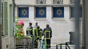 French police fatally shot a man Friday morning who was suspected of setting a synagogue on fire in Rouen, about 80 miles northwest of Paris. The man, armed with a knife and an iron bar, attacked officers responding to the synagogue blaze. An officer fired at the assailant, resulting in his death. The fire was subsequently brought under control.