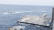 The U.S. military has finished setting up a floating pier for Gaza to help bring humanitarian aid into the area. The Pentagon reports that as part of this initiative, a ship has been anchored in the Mediterranean Sea to start offloading supplies, noting that no military personnel are expected to enter Gaza.