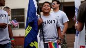 Active duty sailors in the Navy prepare to march during the San Diego gay pride parade in 2011.