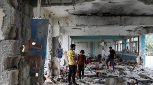 Israel struck a Hamas compound in a Gaza school, claiming it killed fighters. Hamas-run media said 30 civilians died.