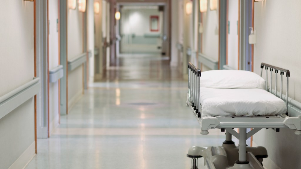 Treating patients in corridors has become a routine occurrence, indicative of a crisis within the system.