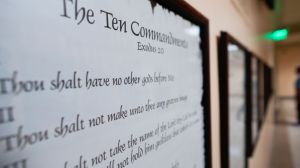 Amid a lawsuit, Louisiana has agreed to delay the implementation of law that requires the Ten Commandments to be displayed in every classroom.