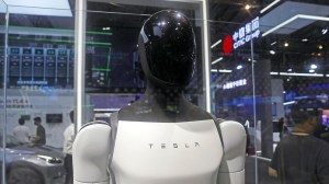 Tesla's Optimus humanoid robot project faces delays and skepticism despite rolling out functional prototypes.