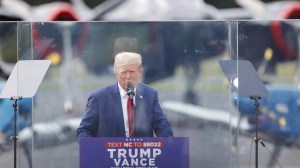 Former President Trump held his first outdoor rally since an assassination attempt, speaking behind bulletproof glass.