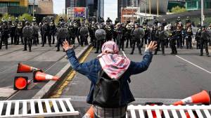 Anti-war protesters clashed with police on Wednesday, Sept. 11, outside a defense expo in Melbourne, Australia.