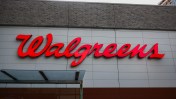 Walgreens agreed to pay $106 million to settle lawsuits accusing the pharmacy chain of fraudulently billing government health programs.