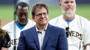 Milwaukee Brewers owner Mark Attanasio is entangled in a legal dispute over the removal of sand from a public beach near his Malibu property.