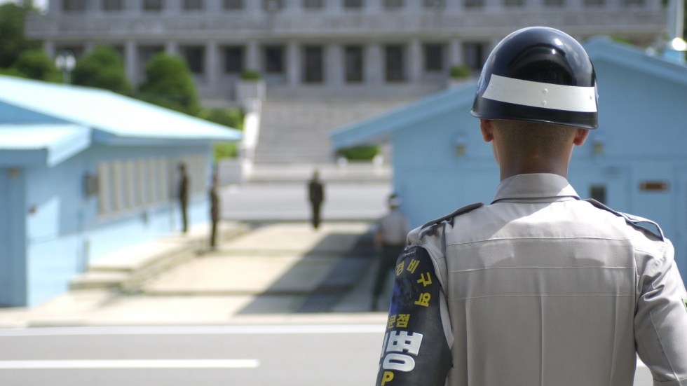 South Korean police detain North Korean defector who attempted to cross border back to North on stolen bus.