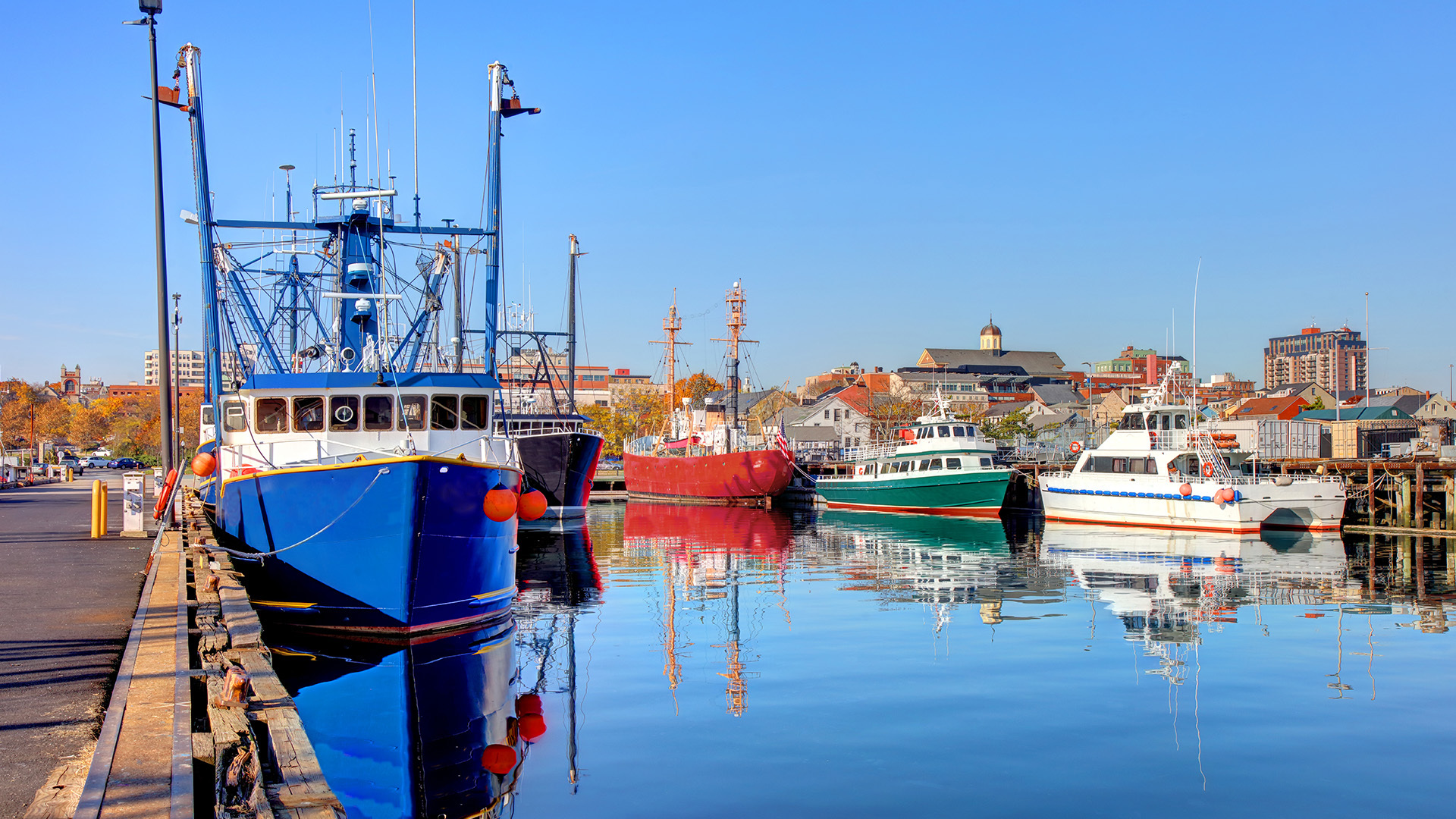 New Bedford's fishing industry is urging federal officials to adjust planned offshore wind developments to protect vital scalloping grounds.