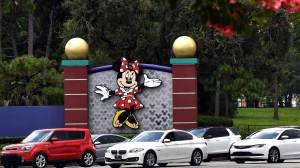 As Hurricane Milton approaches Florida, Disney World in Orlando remains open, while Universal and other theme parks are closing.