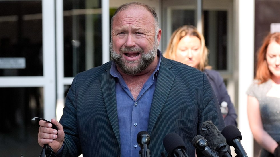 A judge has paused the sale of Alex Jones’ Infowars to satirical news outlet The Onion over concerns about the auction’s transparency.