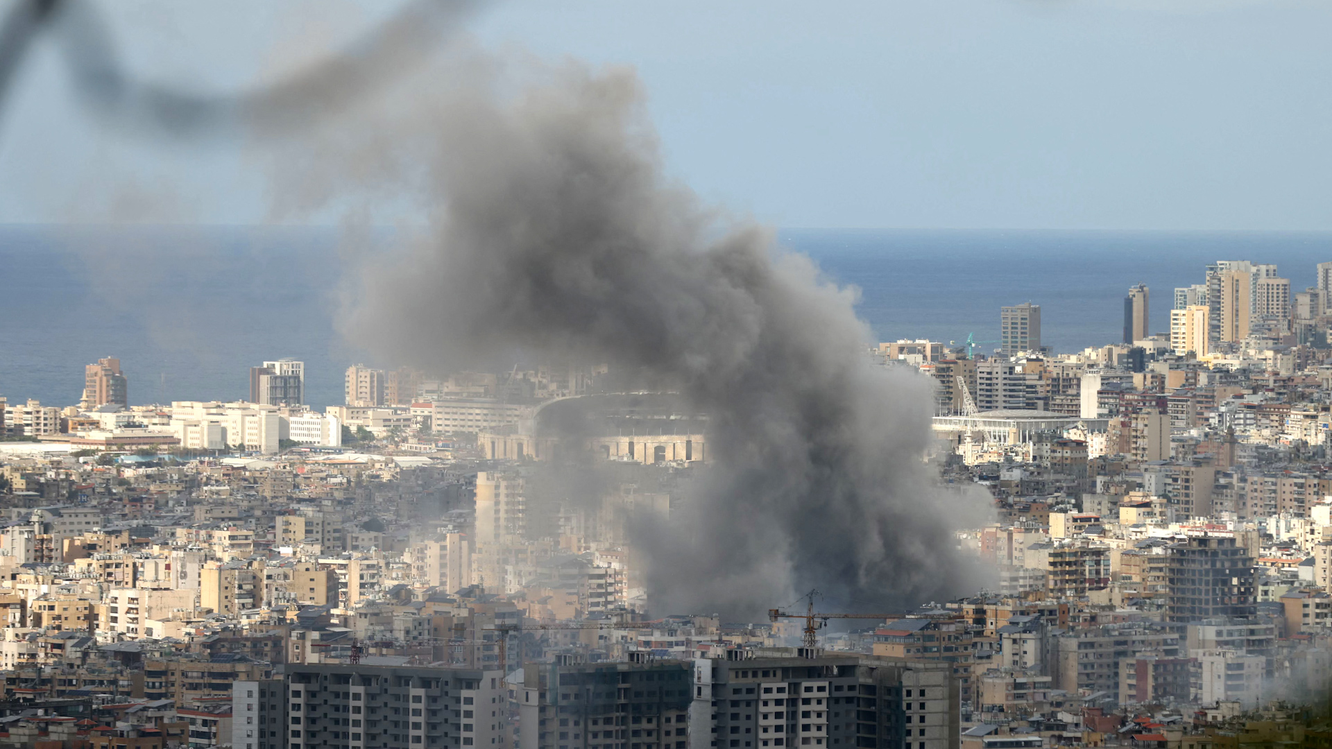 Israel and Hezbollah are trading deadly strikes despite ceasefire talks. A US proposal is awaiting Israel's approval, with the goal of returning tens of thousands of evacuated Israelis home. Hezbollah has launched over 200 rockets and drones at Israel, while Israel continues to target Beirut. The conflict has killed over 3,500 people, mostly in Lebanon, since October 2023.