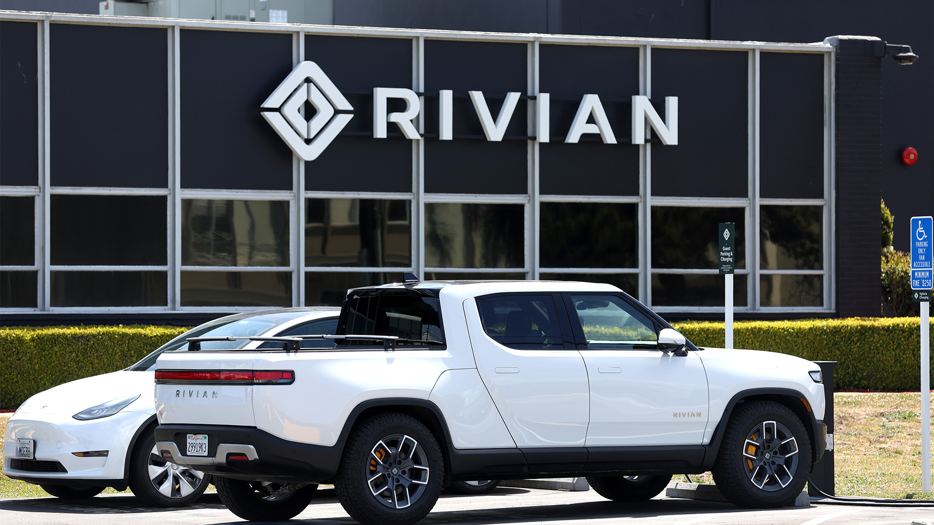 Biden administration approves $6.6B loan to Rivian, which has billions in  debt