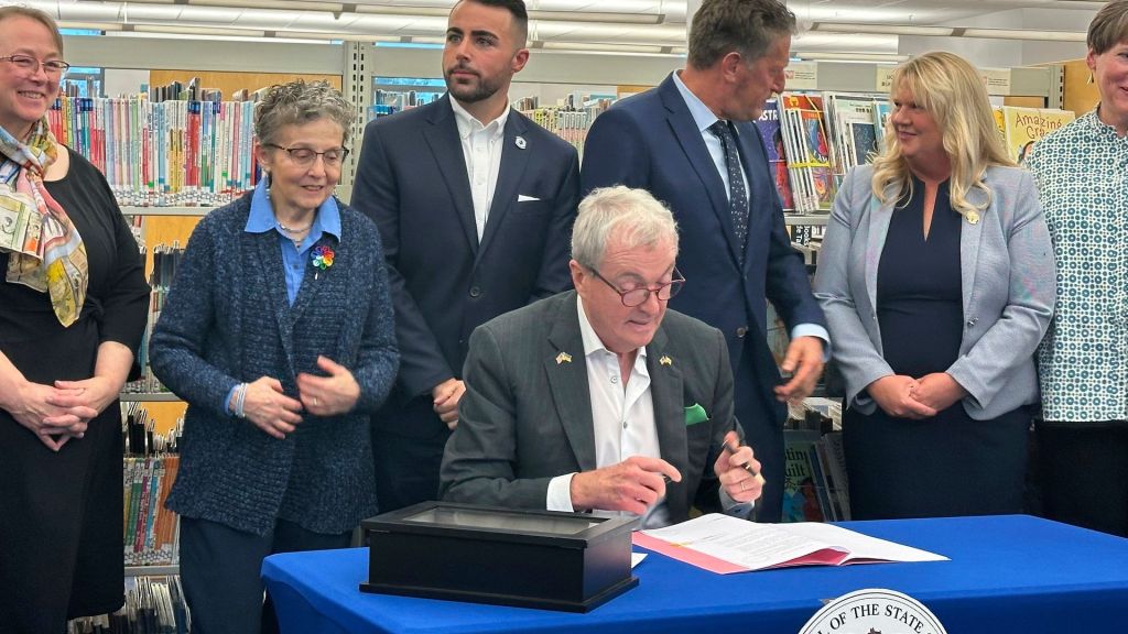 New Jersey's Democratic Governor Phil Murphy signed a law prohibiting public and school libraries from banning books in the state on Monday.