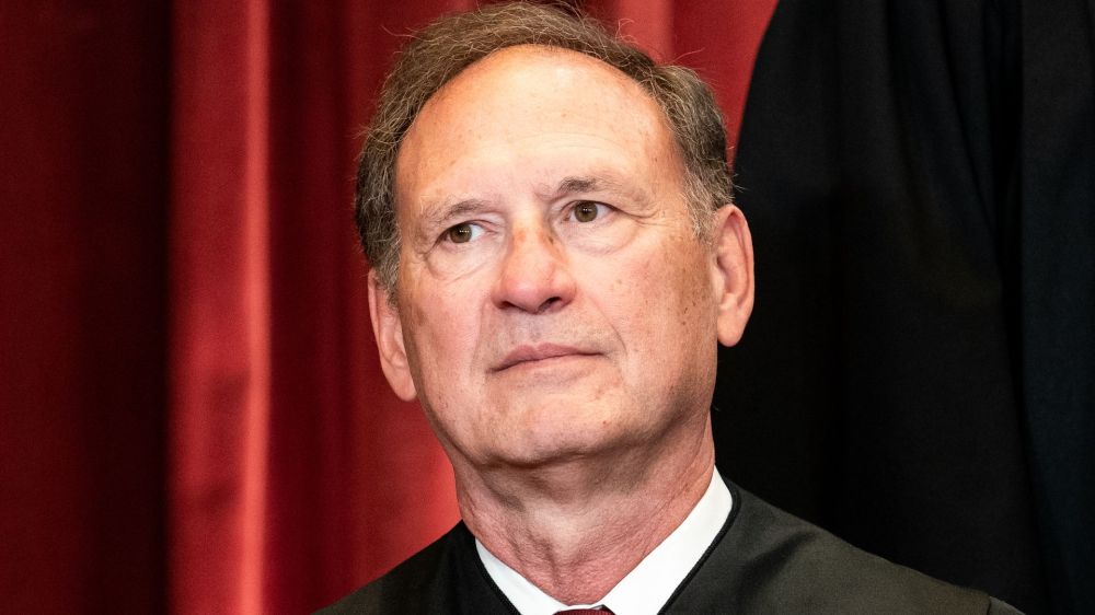 A district court judge violated ethics rules by criticizing Supreme Court Justice Samuel Alito for flying flags with pro-Trump associations.