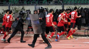 A deadly stampede at a Guinea soccer match killed 56 and injured more amid a disputed penalty as security forces used tear gas in response.