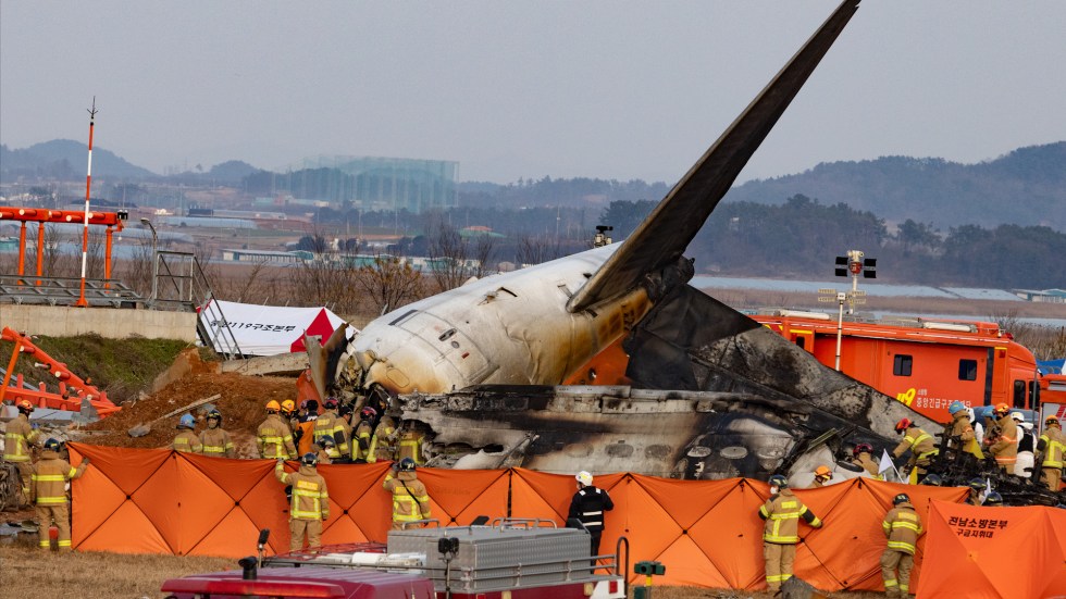 South Korea plane crash kills 179, injures 2 crew members, after Boeing 737-800 skids off runway and bursts into flames.