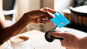 The battle to lower credit card swipe fees for small businesses has stretched into the new year.