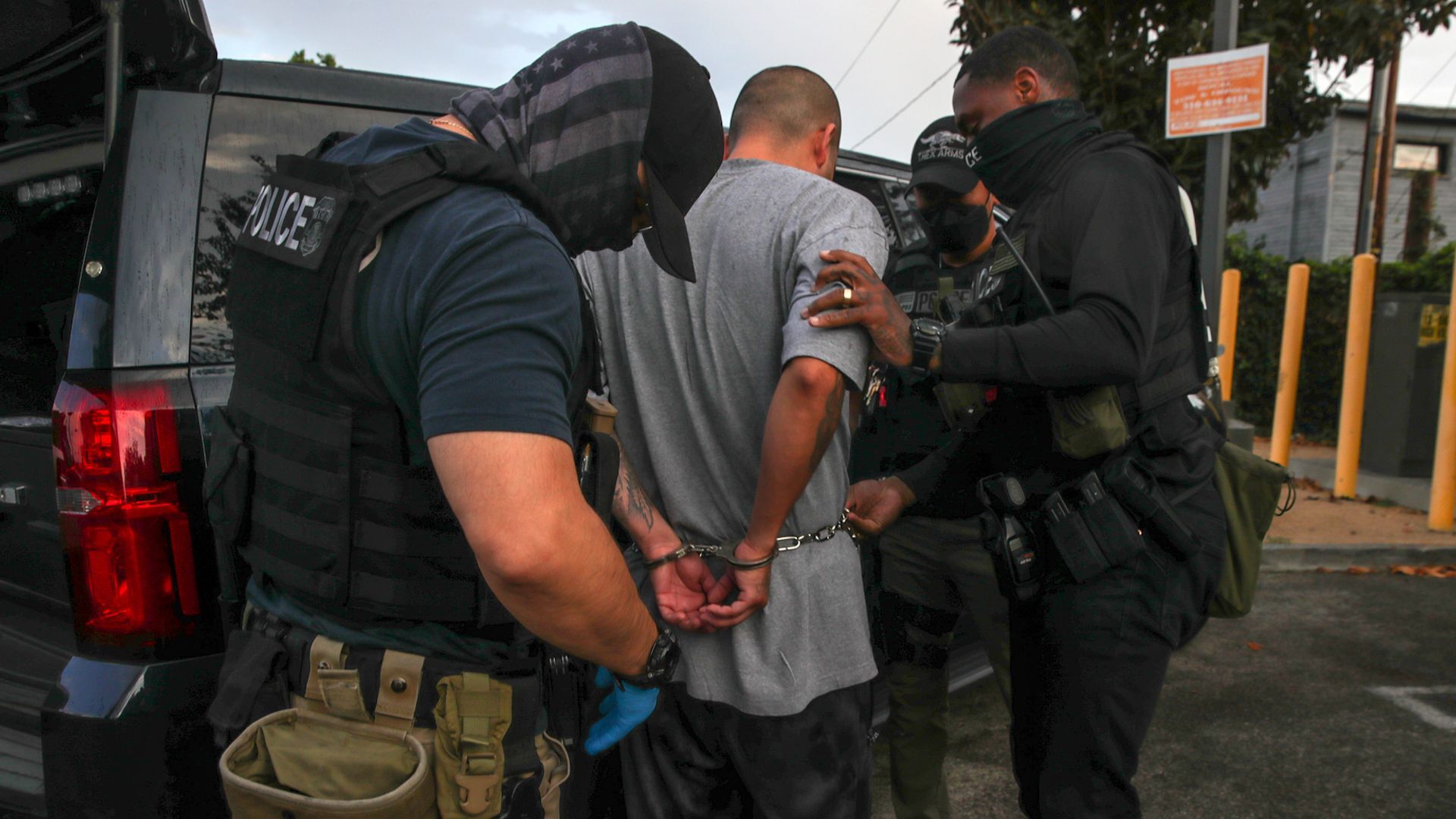 During raids, Immigration and Customs Enforcement (ICE) officials arrested hundreds of migrants illegally in the U.S.; media coverage varied.