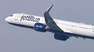 Massachusetts State Police arrested a JetBlue passenger Tuesday after he opened an emergency door on a flight taxiing for takeoff in Boston.