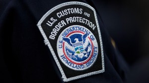 A U.S. Customs and Border Protection officer was arrested for allegedly smuggling migrants and drugs across the southern border.