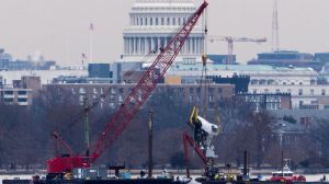 Officials said flight recordings suggest the crew may have missed instruction to pass behind the jet due to a "keyed microphone."