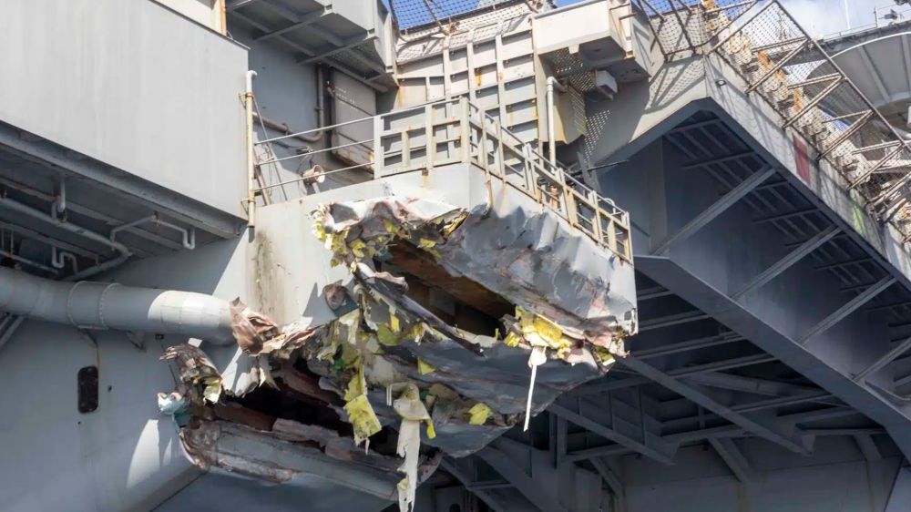 An American aircraft carrier and a Panamanian merchant ship collided near Port Said, Egypt, located at the northern tip of the Suez Canal.