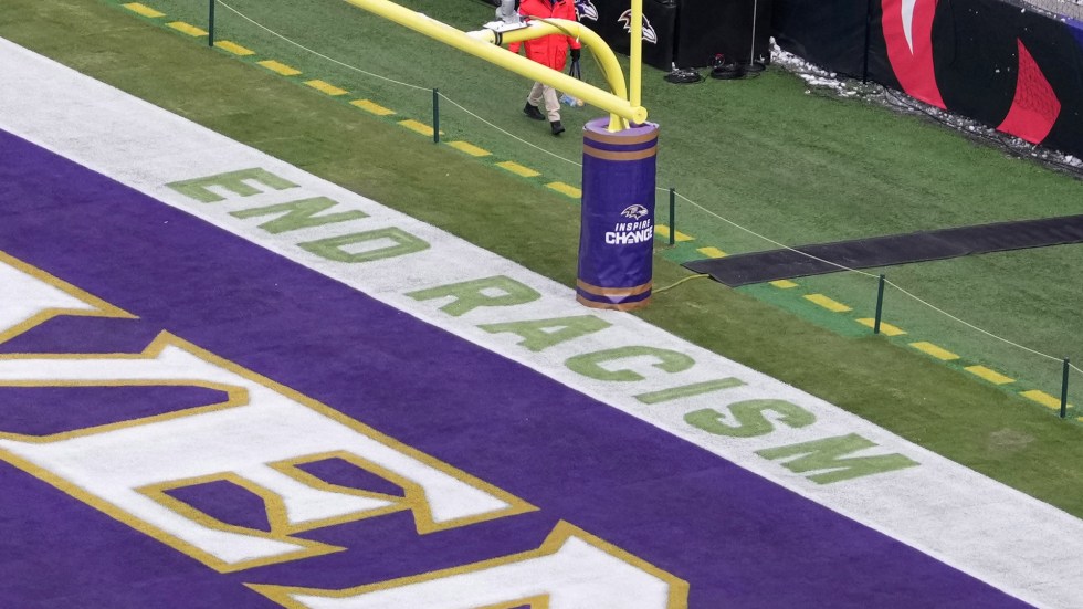 The NFL has removed the slogan 'End Racism' from the Superdome end zones as the league prepares for the 2025 Super Bowl.