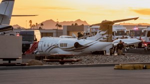 A private jet, Learjet 35A, crashed at Scottsdale Airport, killing one person and injuring at least three others. The plane veered off the runway and collided with a parked Gulfstream 200 business jet due to a reported landing gear failure.