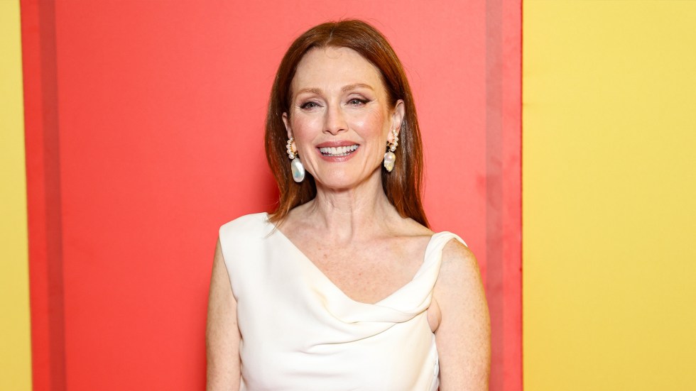 Actress Julianne Moore said her book about embracing diversity has been removed from schools serving military families.