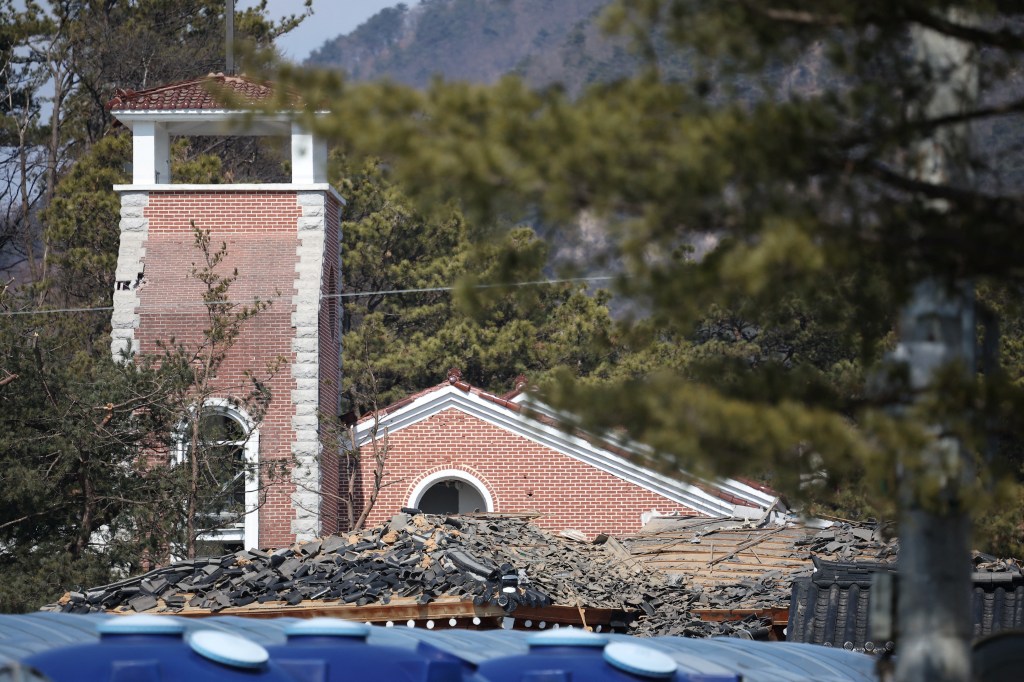 Debris lies at a damaged church after MK-82 bombs fell outside the shooting range during joint live-fire exercises near the demilitarized zone separating two Koreas in Pocheon, South Korea, March 6, 2025. REUTERS/Kim Hong-Ji