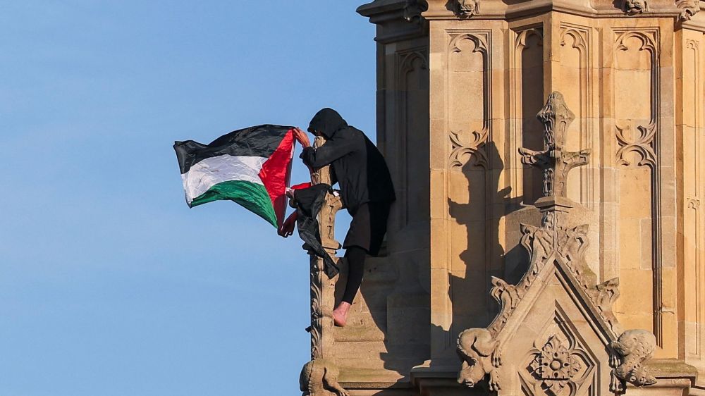 A protester climbed London's Big Ben with a Palestinian flag on Saturday, prompting the closure of Westminster Bridge.